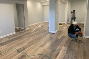 R Contracting Services replacing LVP flooring in a basement in gwinnett county