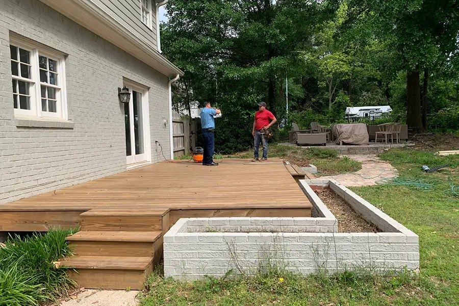 R Contracting crew building a deck in Snellville